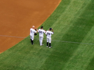 Brett Gardner, Jacoby Ellsbury and Chris Young right before the "Star Spangled Banner."